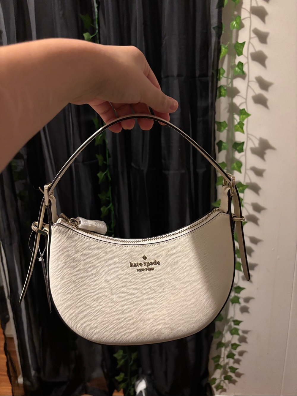 kate spade cream crescent shoulder bag with gold logo